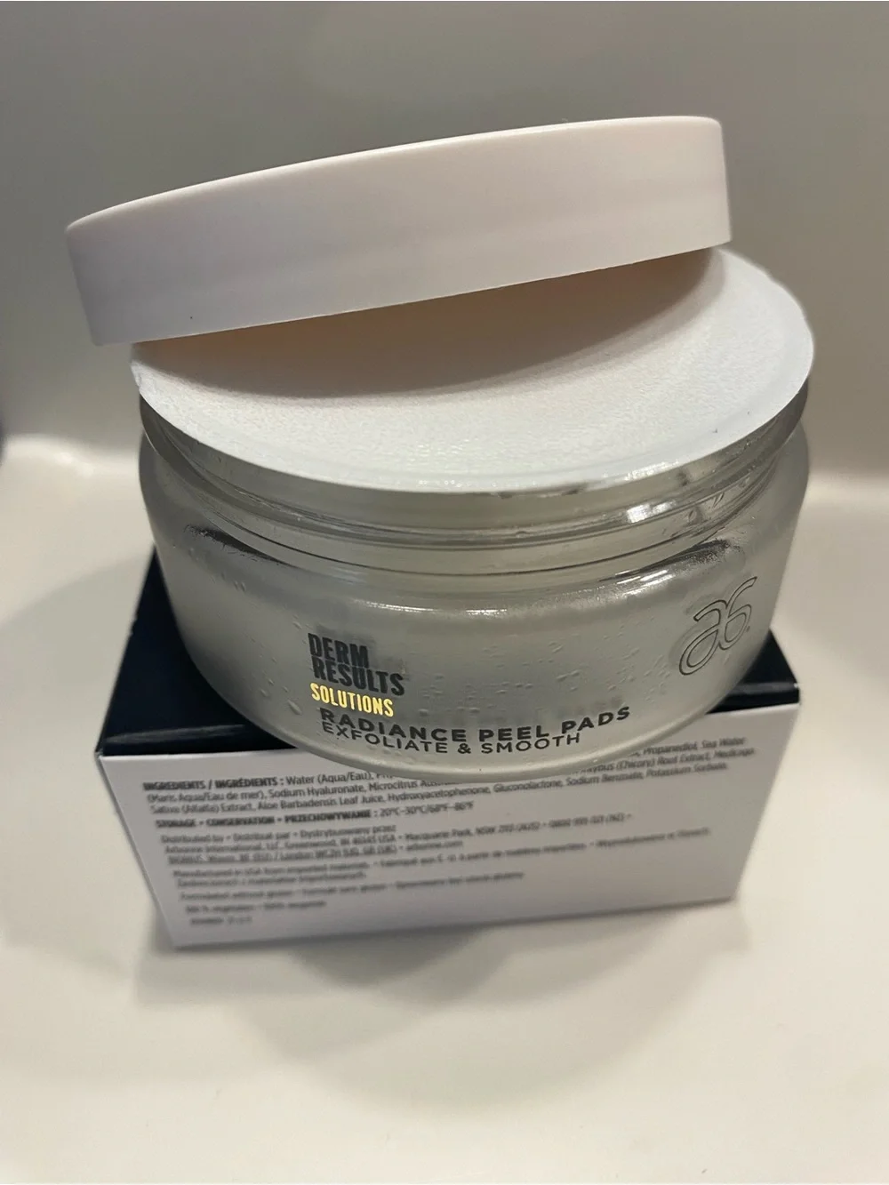 Arbonne Radiance Peel Pads - White and Black Packaging